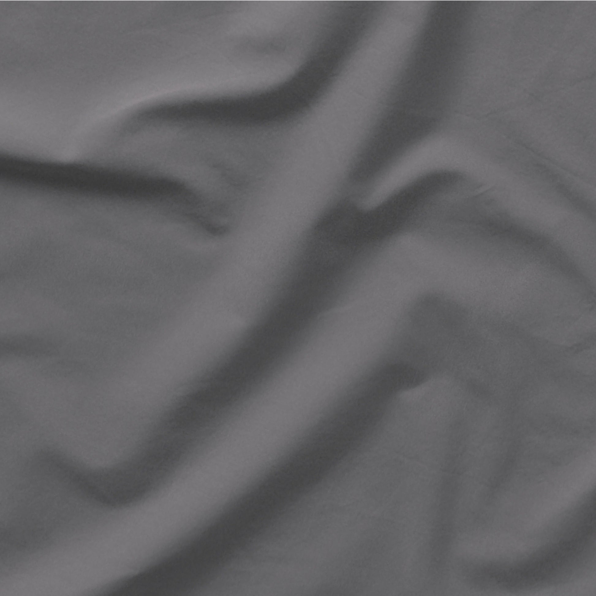 The Tuft and Needle Classic Percale Sheet Set, one sheet spread out || color: Gray Quill
