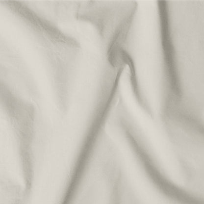 The Tuft and Needle Classic Percale Sheet Set, one sheet spread out || color: Sand
