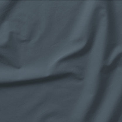 The Tuft and Needle Classic Percale Sheet Set, one sheet spread out || color: Slate
