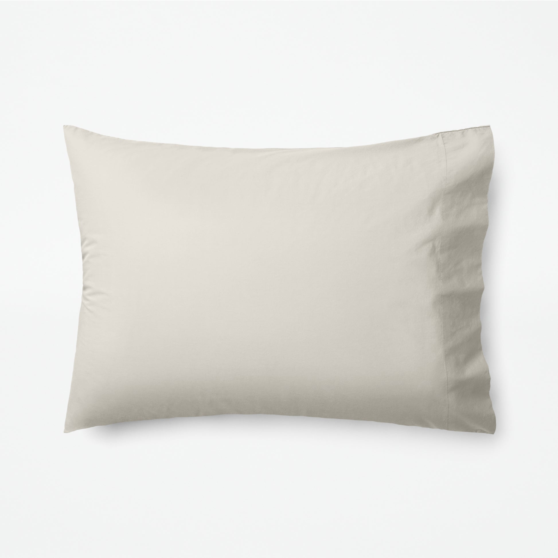 The Tuft and Needle Classic Percale Pillowcase Set, 1 pillow in a pillowcase showing in a horizontal position || color: Sand
