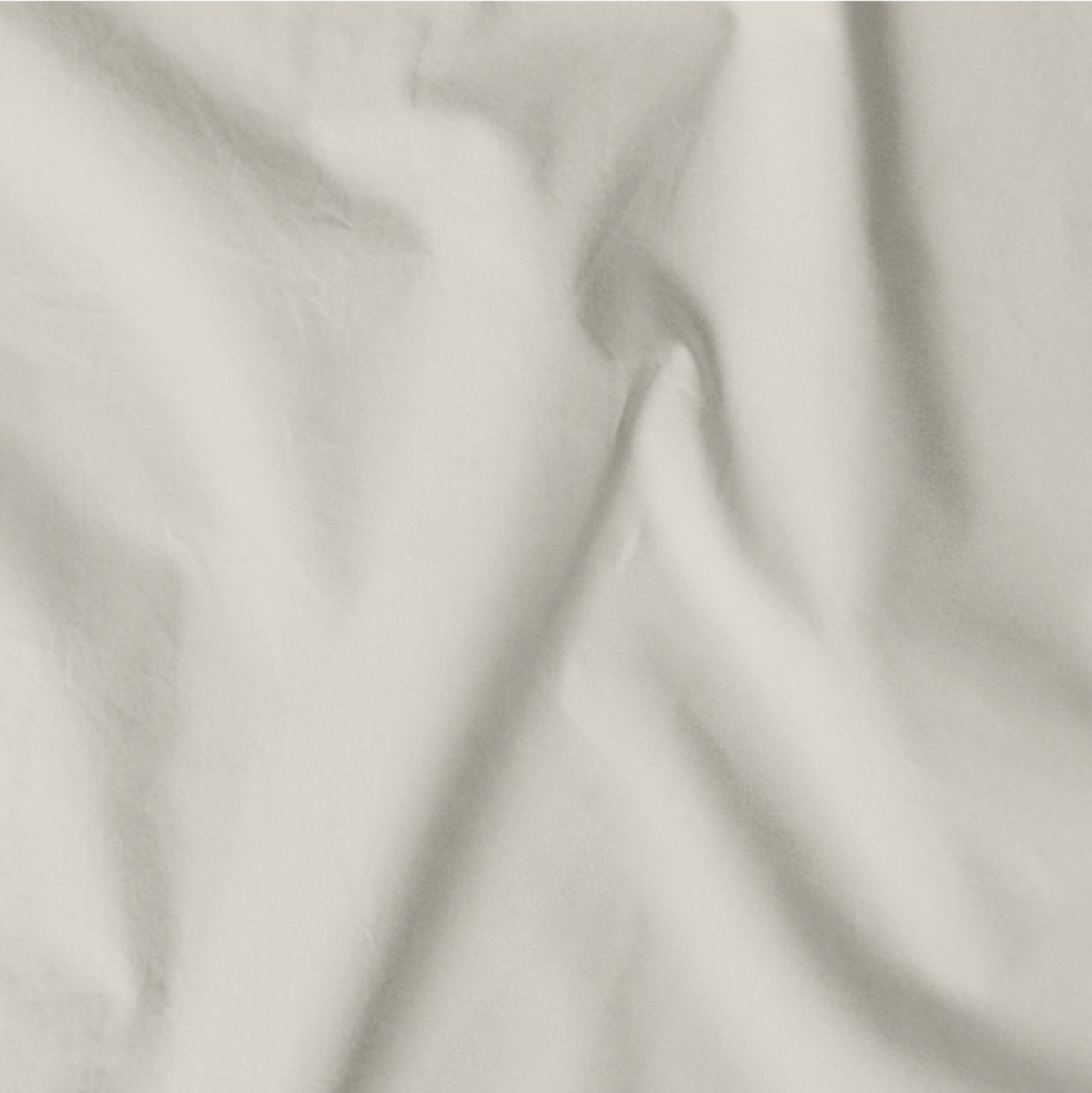 The Tuft and Needle Classic Percale Pillowcase Set, one sheet spread out || color: Sand
