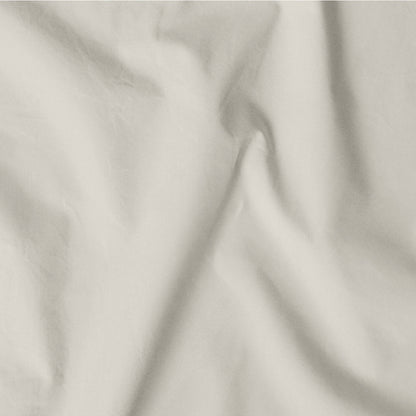 The Tuft and Needle Classic Percale Pillowcase Set, one sheet spread out || color: Sand
