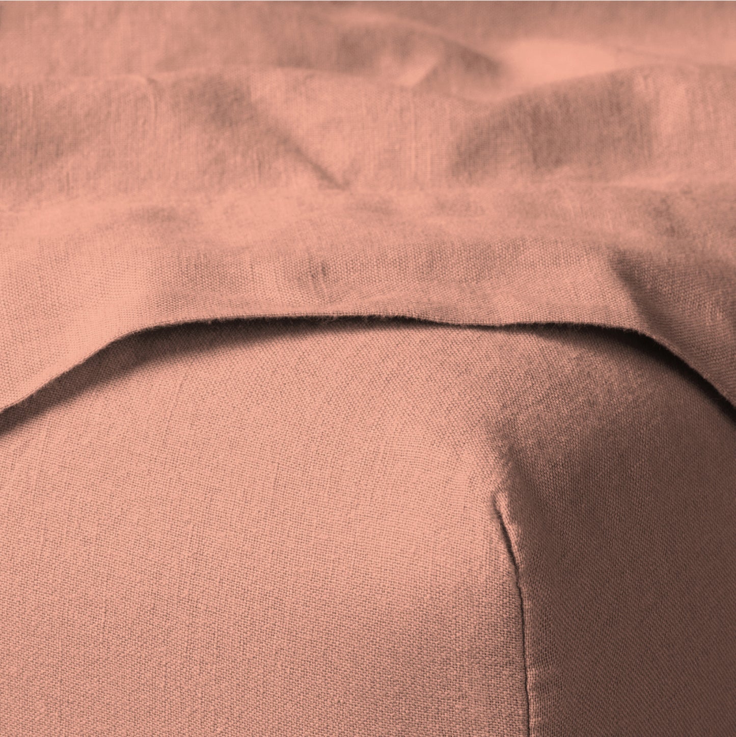 The Tuft and Needle Linen-Cotton Blend Sheet Set, corner of a mattress with both sheets showing || color: Muted Clay
