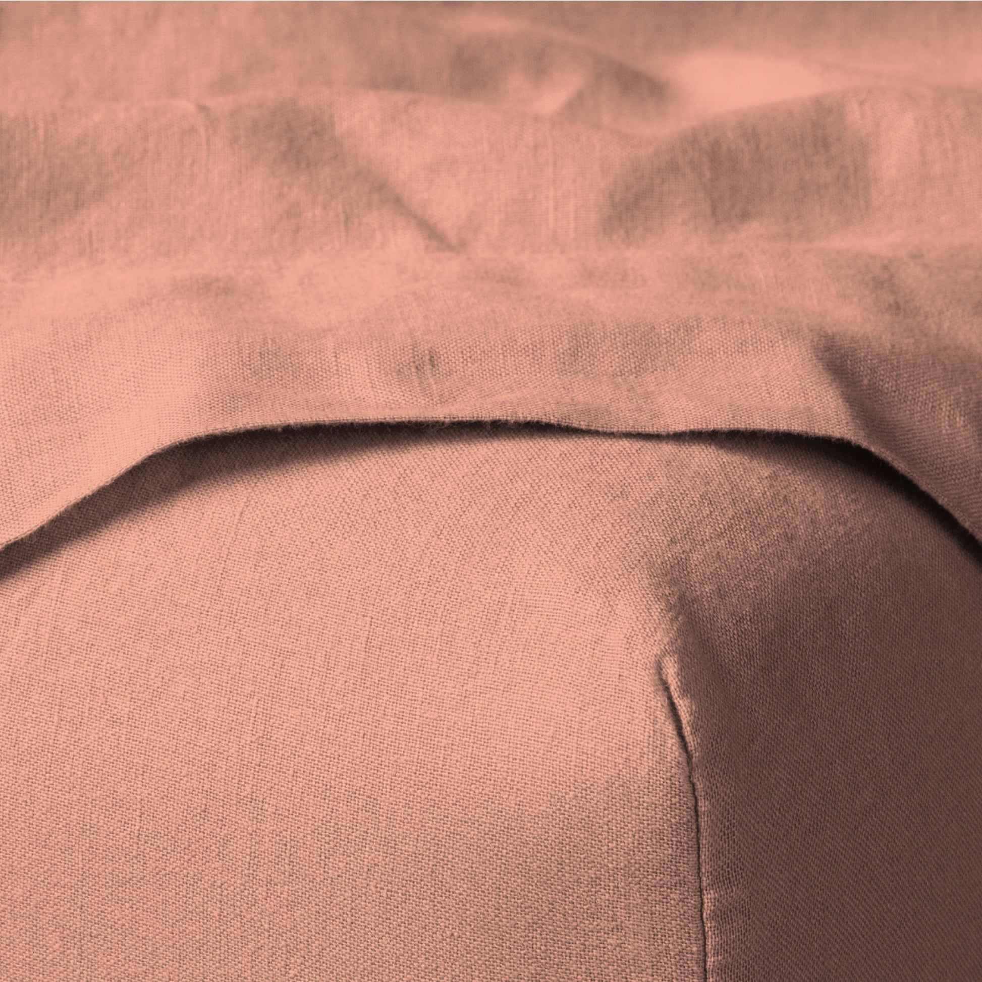 The Tuft and Needle Linen-Cotton Blend Sheet Set, corner of a mattress with both sheets showing || color: Muted Clay
