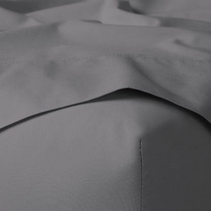 The Tuft and Needle Classic Percale Sheet Set, corner of a mattress with both sheets showing || color: Gray Quill
