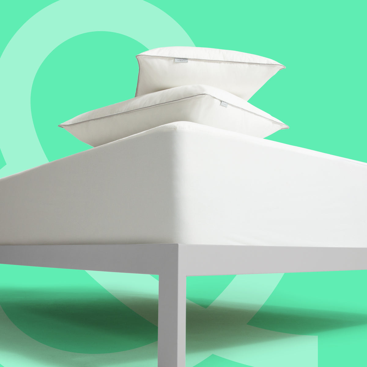 Tuft and Needle Basics bundle on top of a mattress