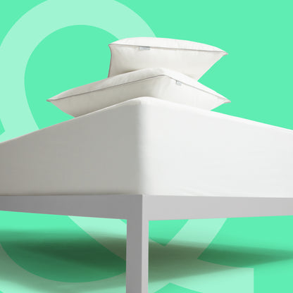 Tuft and Needle Basics bundle on top of a mattress