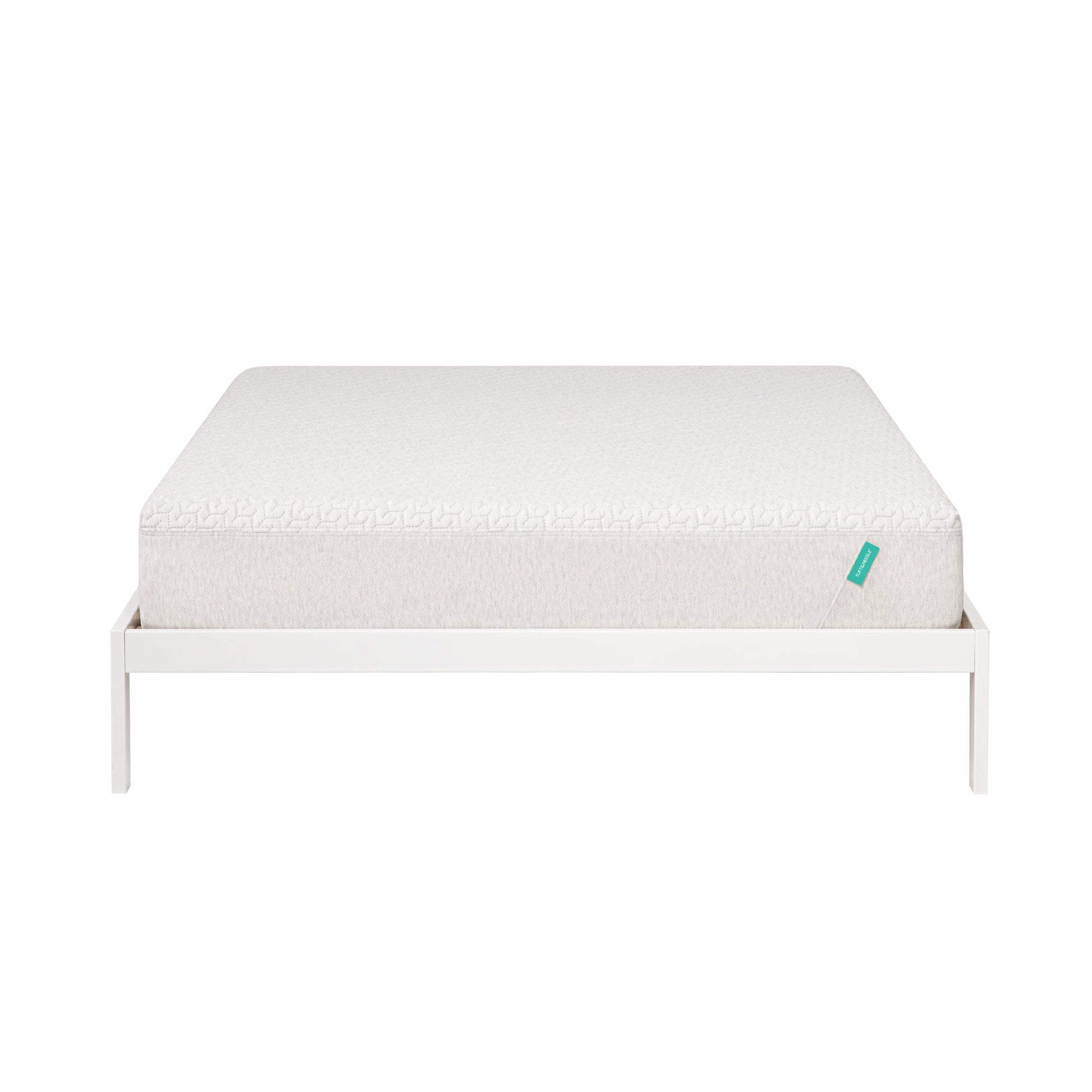 Foam mattress sites on a white bed frame. 