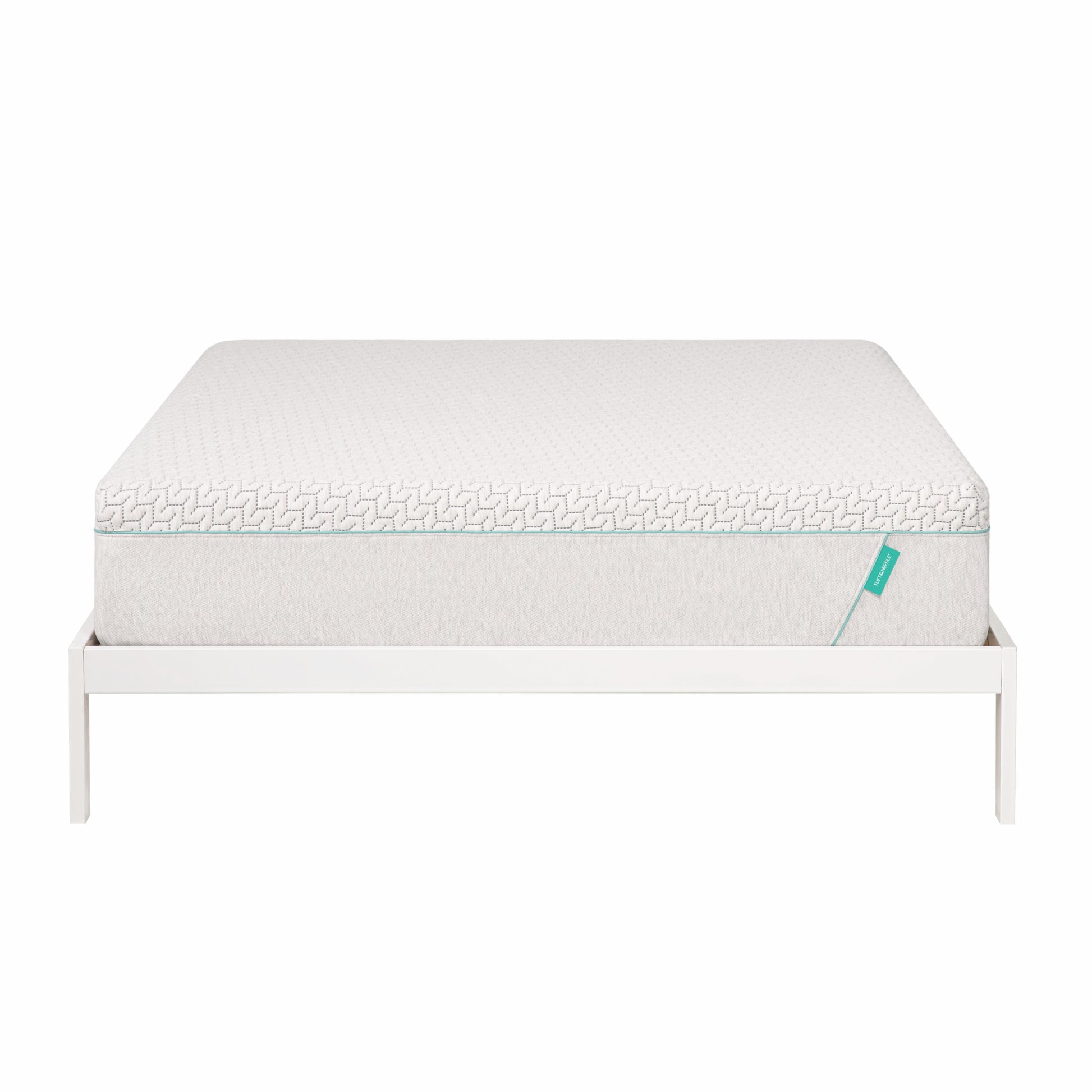 Hybrid mattress sits on white bed frame.
