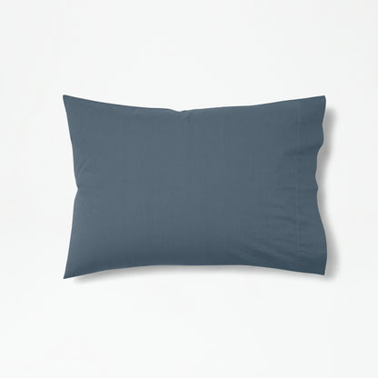 The Tuft and Needle Percale Pillowcase Set on one pillow ||color:slate