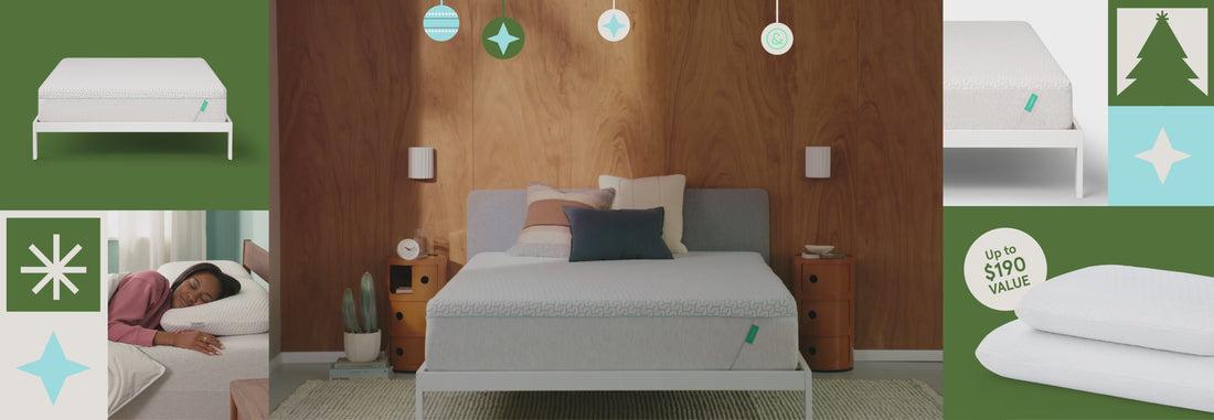 Holiday themed bedroom containing the Tuft & Needle original mattresses with three pillows on top of it in a white bedframe.