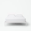 The Tuft and Needle Essential Platform Bed Frame with a mattress||color:white