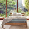 The Tuft and Needle Wood Frame with a mattress in a bedroom ||color:oak